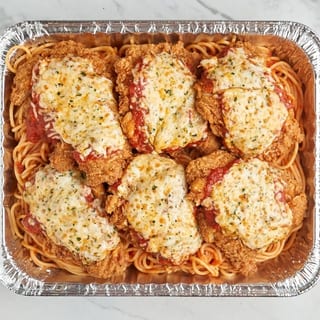 Family Chicken Parmigiana Over Spaghetti